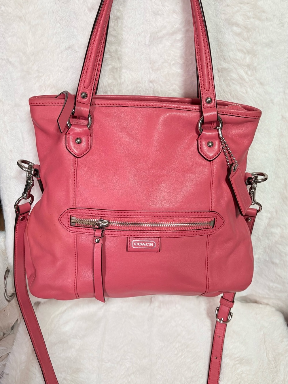 coral pink Coach Mia leather tote bag with silver hardware